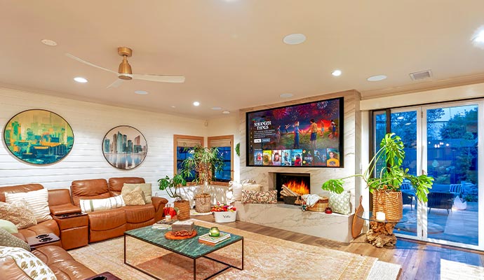 Bright modern living room featuring a wall-mounted smart TV for a comfortable entertainment area
