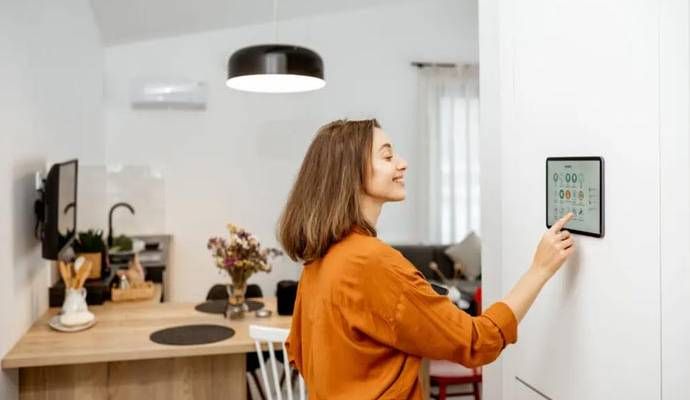 A girl using smart home media control device