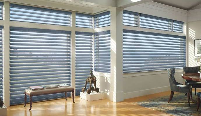 Modern home with motorized window shades Installed motorized window covering in a residential space