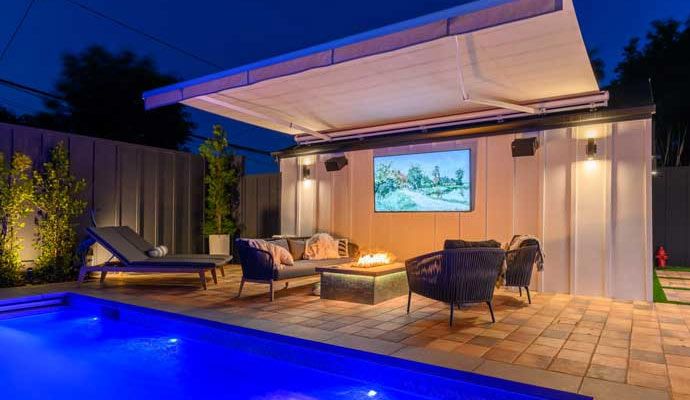 Installed outdoor shades near a residential swimming pool