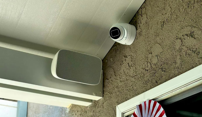 Installed security camera on exterior wall