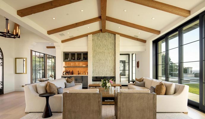 luxurious living room with vaulted ceiling